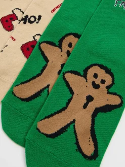 Sale Cropp 2 pack świątecznych skarpet w pierniczki zielony