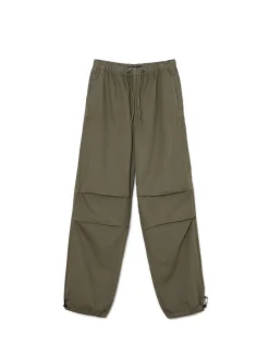 Sale Cropp Ciemnozielone jeansy parachute zielony
