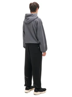 Outlet Cropp Dresowe joggery z odblaskowym printem czarny