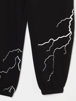Outlet Cropp Dresowe joggery z odblaskowym printem czarny