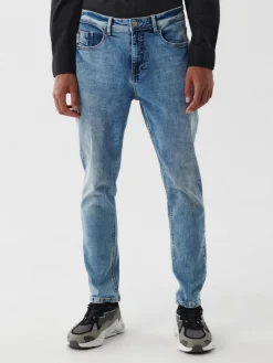 Online Cropp Jasne jeansy carrot niebieski