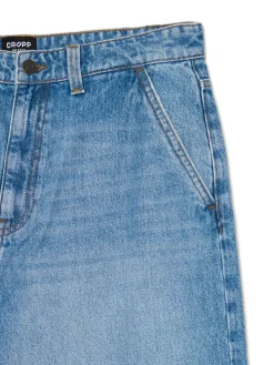 Outlet Cropp e jeansy skater z efektem sprania niebieski