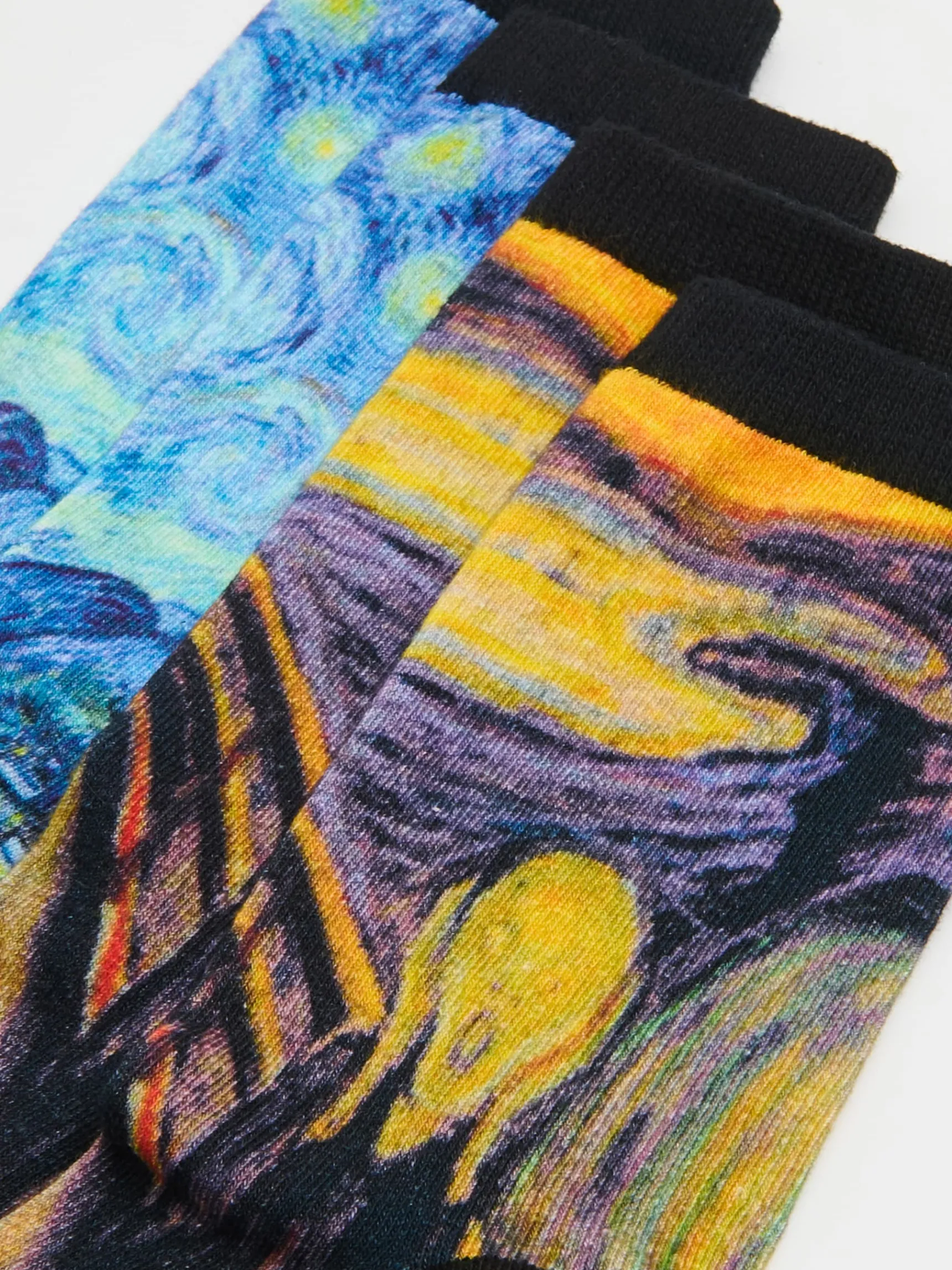 Discount Cropp Skarpety z nadrukiem znanych artystów czarny