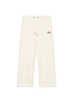 Clearance Cropp Spodnie dresowe z zatrzaskami kremowy